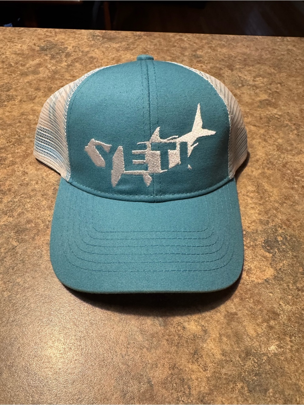 Yeti Teal and White Trucker Hat with Fish Logo
